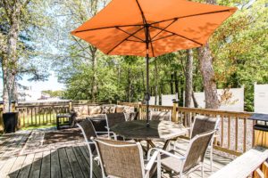 Photo of deck with patio furniture